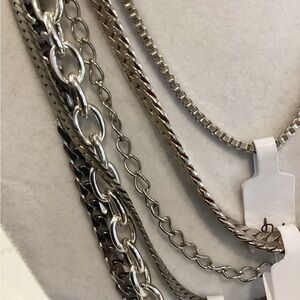 Silver tone chains  Set of six.